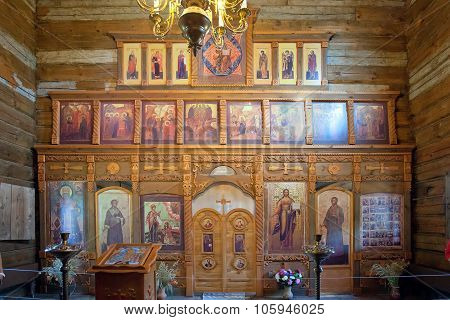 Iconostasis In Ancient Wooden Christian Church. Russia