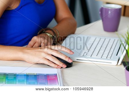 Female Designer Hands Working With Laptop Computer
