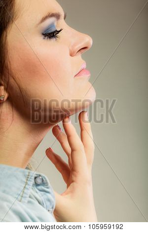 Woman Scratching Her Neck