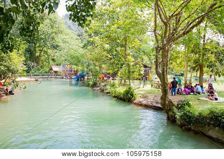 Tourists enjoy at Blue Lagoon, Vangvieng, Laos