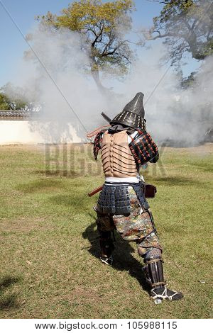 Japanese samurai with fire lock rifle