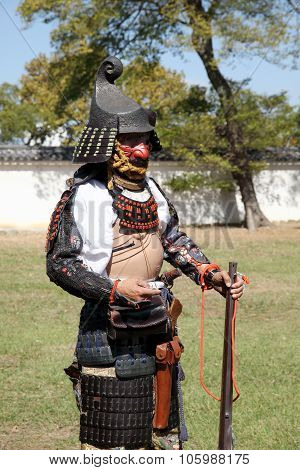 Japanese samurai with old rifle