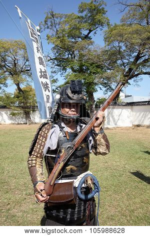 Japanese samurai with fire-lock rifle