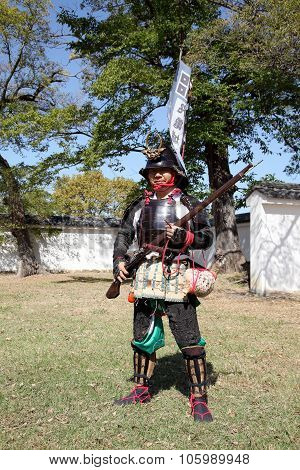 Japanese samurai with old rifle