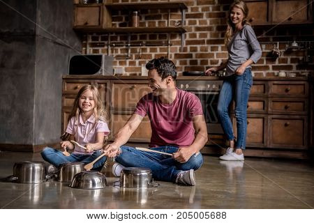 Family In Kitchen