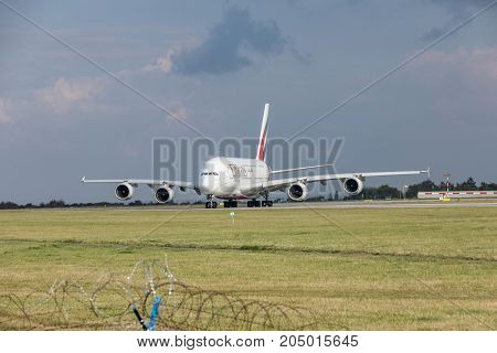 PRAGUE CZECH REPUBLIC - SEPTEMBER 20 2017: EMIRATES AIRLINES Airbus A380-800 rolls on the runway before departure from Prague. Emirates is an airline of the United Arab Emirates based in Dubai.