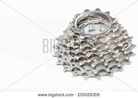 Road bike cassette spare parts on white background