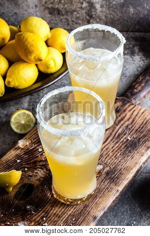 Drink Michelada chilena. Traditional Latin American chilean mexican refreshing beer drink with lemon, salt and ice.