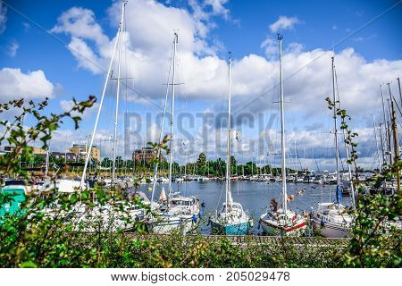 Yacht docking at harbor at the end of Langelinie in Copenhagen, Denmark