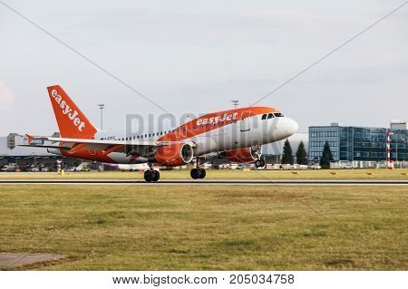 PRAGUE CZECH REPUBLIC - SEPTEMBER 20 2017: EasyJet Airline Airbus A319-111 lands to PRG Airport in Prague. EasyJet is the second-largest low-cost carrier in Europe.
