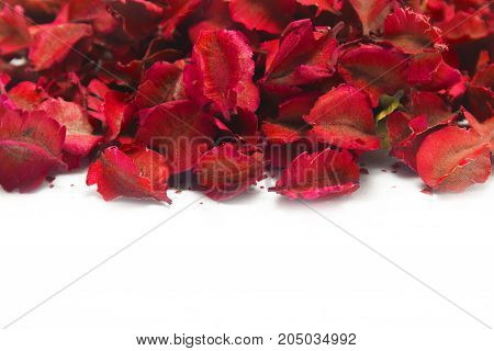 A pile of autumn leaves with red color paint is dried leaves on a white color background. Floral and leaves concept. copy space for decorative writing text.