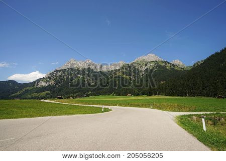 Road in the Tyrolean Alps in the direction of the Mount Red Flueh