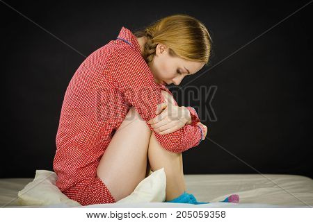 Sad Depressed Young Woman In Bed