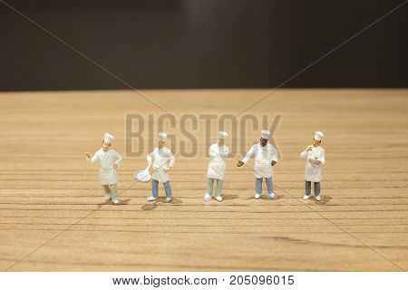 Tiny Of Cook Are Talking In The Kitchen.