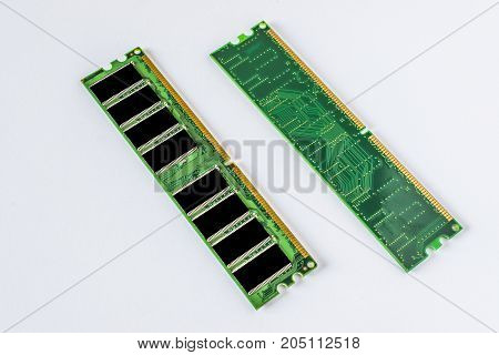Green DDR RAM memory modules on a white background