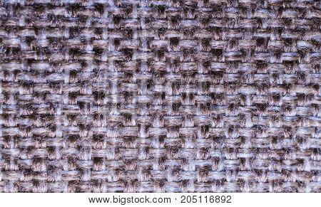 Grey fabric background made of wool textile