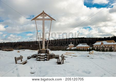 Holy spring gremyachiy Klyuch. Memorial cross at Calvary Svyatogorye. Moscow region Sergiev Posad district village Vzglyadnevo