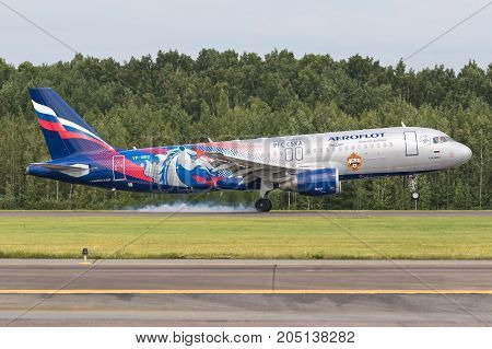 Pulkovo, Saint-Petersburg, Russia - August 10, 2017:   The airplane  Airbus A320 of Aeroflot  airlines is landing on the runway. Has a special livery - PFC CSKA