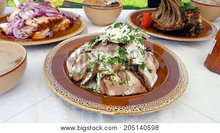 Traditional Romanian pork dish on a outdoor buffet