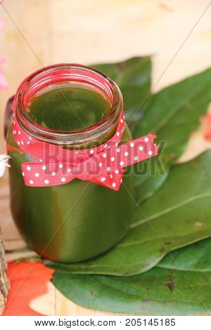 Bamboo grass juice or Tiliacora triandra (bai-ya-nang)