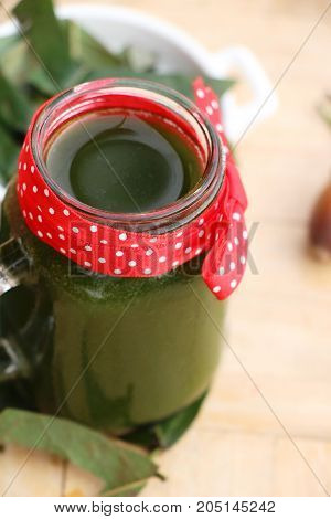 Bamboo grass juice or Tiliacora triandra (bai-ya-nang)