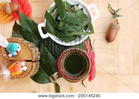 Bamboo grass juice or Tiliacora triandra (bai-ya-nang)