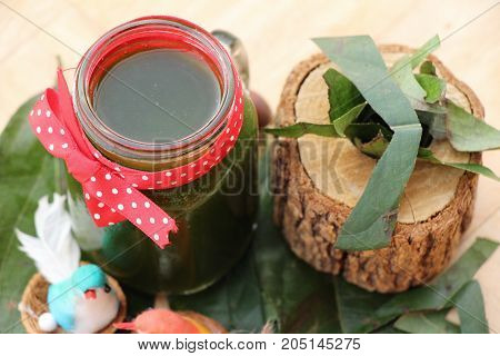 Bamboo grass juice or Tiliacora triandra (bai-ya-nang)