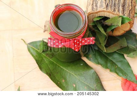 Bamboo grass juice or Tiliacora triandra (bai-ya-nang)