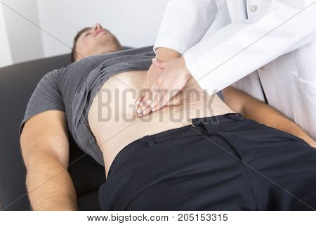 A Doctor examining her patient in medical office