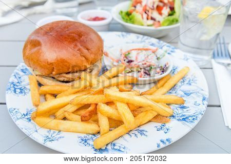 Burger And Chips With Coleslow Salad