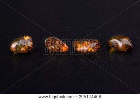 Semiprecious stone Amber the pitch connected with coniferous vegetation. It is applied in production of jewelry.