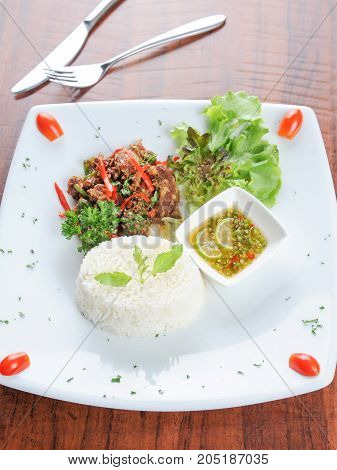 close up Spicy Beef and rice with basil