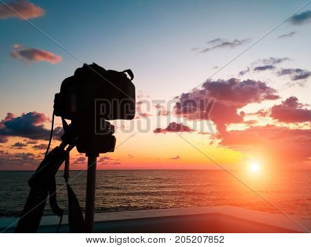 Capture Time-lapse Video On A Slr Camera. The Sun Goes Down The Horizon Of The Sea. Beautiful Sunset