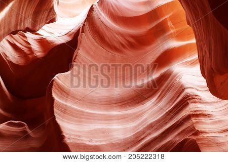 Swirls of old red sandstone wall abstract pattern in Lower Antelope Canyon Page Arizona USA.