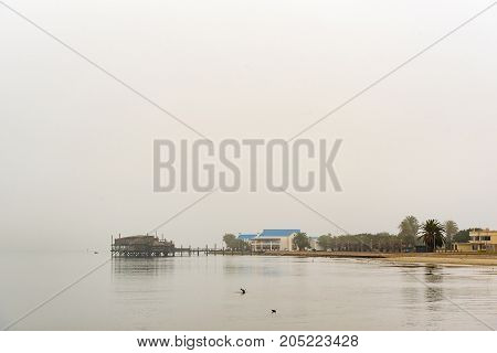 WALVIS BAY NAMIBIA - JULY 1 2017: The Raft Restaurant and a hotel at the lagoon in Walvis Bay on the Atlantic Coast of Namibia