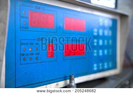 close-up high pressure diesel fuel pump test bench on work
