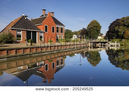 The village Onderdendam on the Boterdiep canal in the Dutch province Groningen