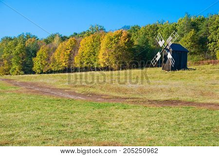 Antique ramshackle wooden windmill Pirogovo Kiev Ukraine