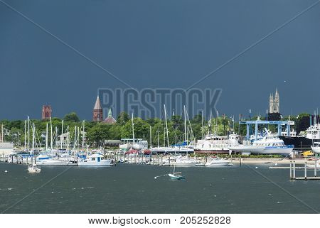 Fairhaven Massachusetts USA - June 22 2007: Summer storm darkening the sky over the Acushnet River