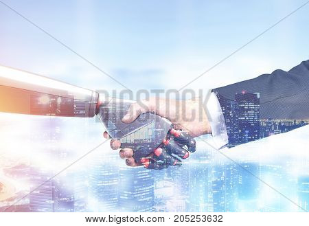 Close up of a businessman in a suit and a robot shaking hands. Blurred cityscape background. Concept of innovation in business. Toned image double exposure