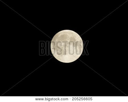 Photo of moon phase catching craters on it's surface