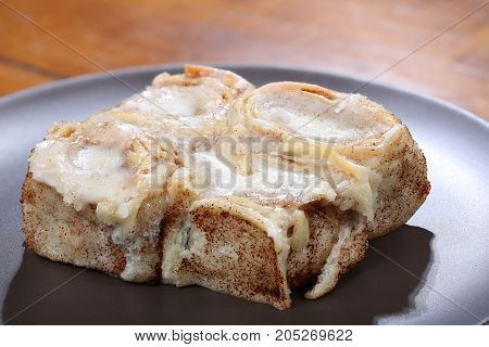 Cinnamon rolls baked fresh with icing added ready to eat