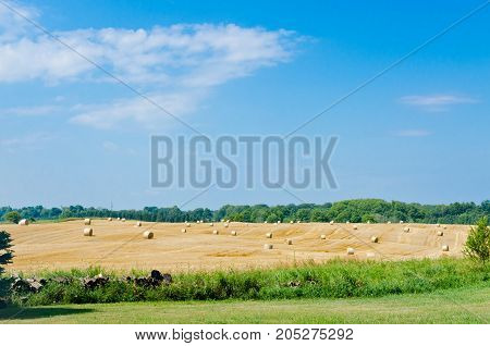 The compressed band on wheat field under blue sky