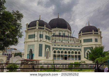 MEDAN, INDONESIA - SEPTEMBER 19,2017 : Great Mosque of Medan or Masjid Raya Al Mashun is a mosque located in Medan, Indonesia. The mosque was built in the year 1906 and completed in 1909 and one of the largest mosques in Medan