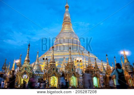 Yangon Myanmar. Sep 9 2017. Myanmer famous sacred place and tourist attraction landmark Shwedagon Paya pagoda illuminated in the evening.