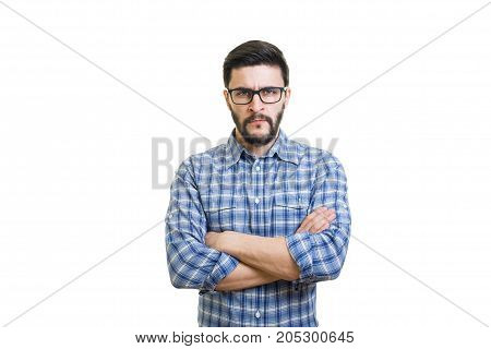 Serious bearded man portrait with rolled sleeves