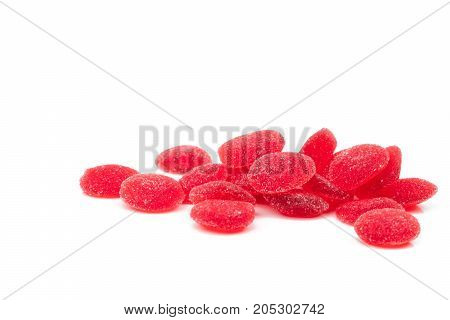 Pile of red vitamin pastille with clipping path. Multivitamin gummy for kids to be healthy concept