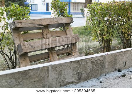 The repair of the road. Pictures of repairing of pedestrian sidewalk. Setting the border