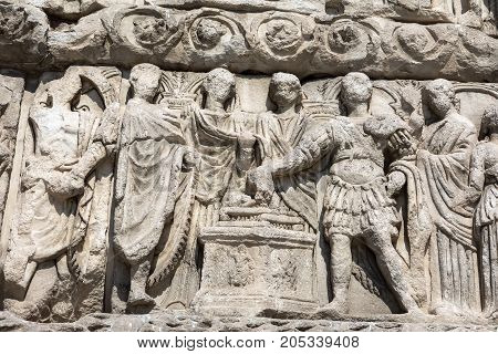 Details Of Arch Of Galerius In Thessaloniki, Greece Depicting Philosophers Of Antique Greece