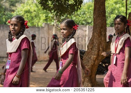 PONDICHERY PUDUCHERY INDIA - SSEPTEMBER 04 2017. School parade of each monday morning with children students in uniforms. They walk sing and pray before going in the classrooms.